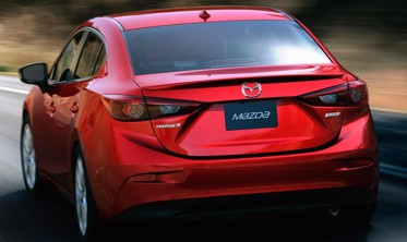 захисна накладка заднього бампера Mazda 3 Sedan фото