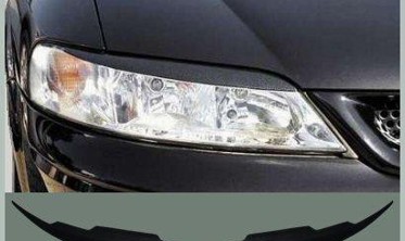 Тюнінгові накладки на фари Opel Vectra B фото