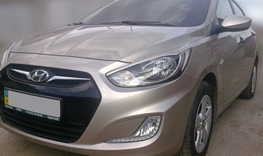 Накладки на фари Hyundai Accent фото