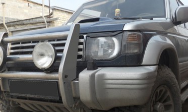 Накладки на фари Mitsubishi Pajero Wagon 2 фото