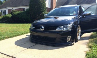 Тюнинговый диффузор переднего бампера Volkswagen Jetta VI GLI фото