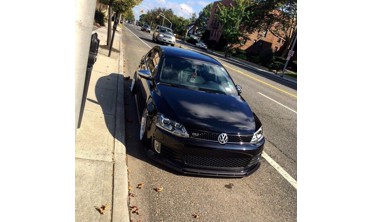 Тюнинговый диффузор переднего бампера Volkswagen Jetta VI GLI фото