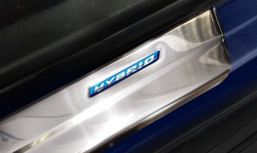 захисні накладки на пороги Toyota Rav IV (suv) із написом Hybrid фото