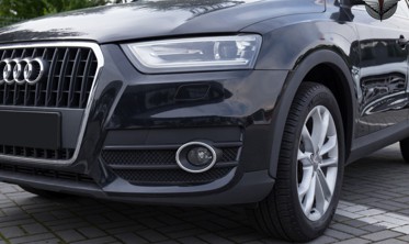 хром накладки вокруг передних противотуманок Audi Q3 фото