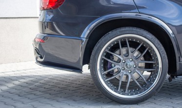 Боковые диффузоры заднего бампера BMW X5 E70 рестайлинг M-pack фото
