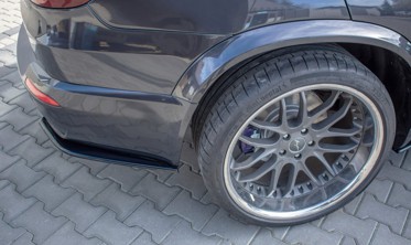 Боковые диффузоры заднего бампера BMW X5 E70 рестайлинг M-pack фото