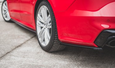 Боковые тюнинг накладки заднего бампера Audi S7 C8 фото