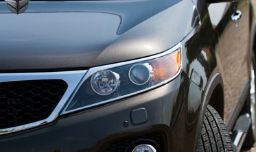 хром накладки передних фар Kia Sorento фото