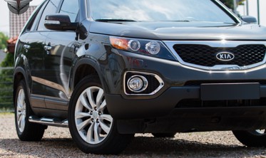 хром накладки передних фар Kia Sorento фото