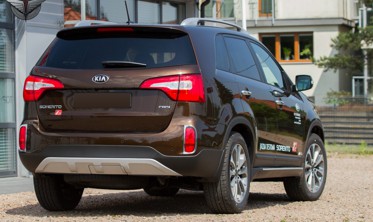 хром накладки противотуманок задних Kia Sorento фото