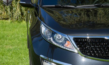 хром накладки на передние фары Kia Sportage фото