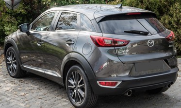 накладки на задні протитуманні ліхтарі MAZDA CX-3 фото