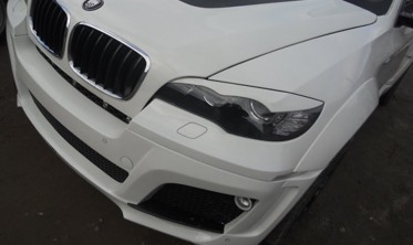 Накладки на фари BMW X6 E71 з вигинами фото