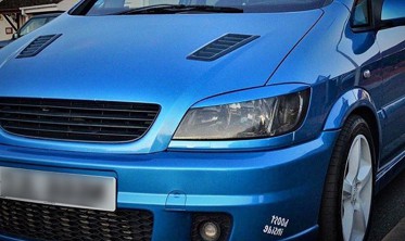 Накладки на передние фары Opel Zafira A  фото