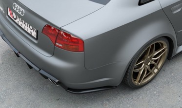 Боковые накладки заднего бамера Audi RS4 B7 Sedan вер.2 фото