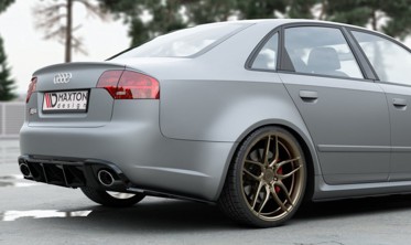 Боковые накладки заднего бамера Audi RS4 B7 Sedan вер.2 фото