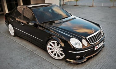 Диффузор переднего бампера Mercedes E W211 версия AMG дорест. фото
