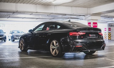 Бічні тюнінгові накладки заднього бампера Audi RS5 F5 рестайл фото