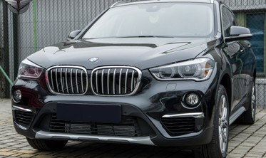 хром накладки противотуманок передних BMW X1 фото