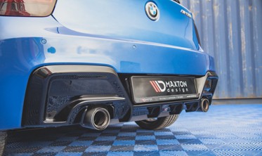 Дифузор заднього бампера під одинарні насадки для BMW M135I F20 фото