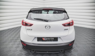 Центральний дифузор (накладка) заднього бампера Mazda CX-3 фото