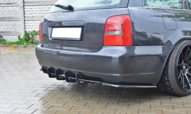 Боковые накладки заднего бампера Audi S4 B5 Avant фото