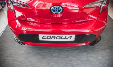 Боковые накладки на задний бампер Toyota Corolla 12 Hatchback фото