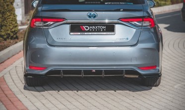 Центральная накладка на задний бампер Toyota Corolla XII седан фото