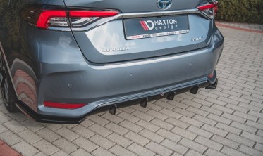 Центральная накладка на задний бампер Toyota Corolla XII седан фото