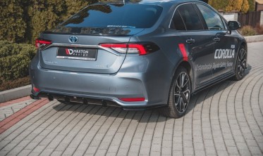 Центральная накладка на задний бампер Toyota Corolla XII седан фото