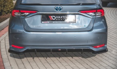 Боковые накладки на задний бампер Toyota Corolla 12 Sedan фото