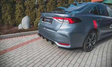 Боковые накладки на задний бампер Toyota Corolla 12 Sedan фото