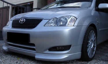 Накладка переднего бампера Toyota Corolla E12 в стиле Sport фото