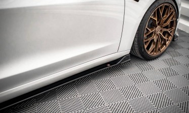 Дифузори (лістви) на бічні пороги Tesla Model 3 фото