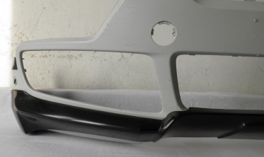 Накладка переднього бампера BMW X5 E70 стиль Aero (дорестайл) фото