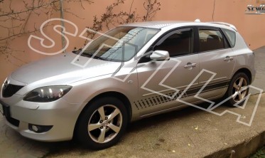 спойлер крышки багажника  Mazda 3 хетчбек фото