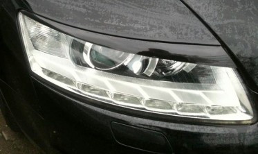 Накладки на фары Audi A6 C6 фото