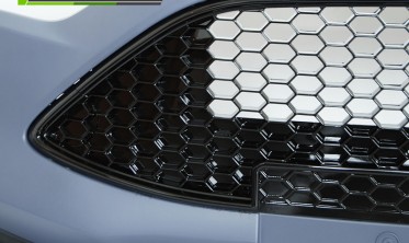 Тюнінговий передній бампер Ford Focus MK3 стиль ST фото
