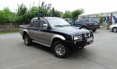 Захисна дуга силового бампера Mitsubishi L200 (1996-2006) фото