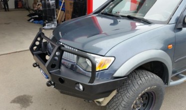 Захисна дуга переднього бампера Mitsubishi L200 (2005-2015) фото
