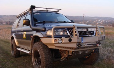 Захисна силова дуга переднього бампера Mitsubishi Pajero Sport (1996-2000) фото