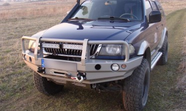 Захисна силова дуга переднього бампера Mitsubishi Pajero Sport (1996-2000) фото