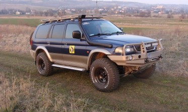 Захисна силова дуга переднього бампера Mitsubishi Pajero Sport (1996-2000) фото