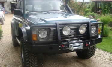 Защитная дуга к бамперу без отверстий для ПТФ NISSAN PATROL Y60 фото