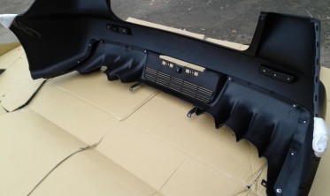 бампер задний Mitsubishi Lancer X в стиле EVO фото
