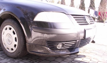 Накладки (клыки) на передний бампер VW Passat B5 (2000-2005) послерестайл фото