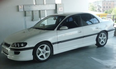 Тюнінгові накладки на пороги Opel Omega B/C фото