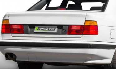 Задній тюнінговий бампер для BMW 5 E34 седан в стилі M5 фото