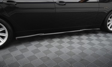Тюнинговые листвы (накладки) на боковые пороги BMW 7 E65 дорестайл фото