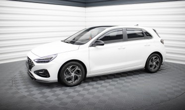 Тюнинговые боковые листвы (накладки) под пороги Hyundai I30 Mk3 рестайл фото